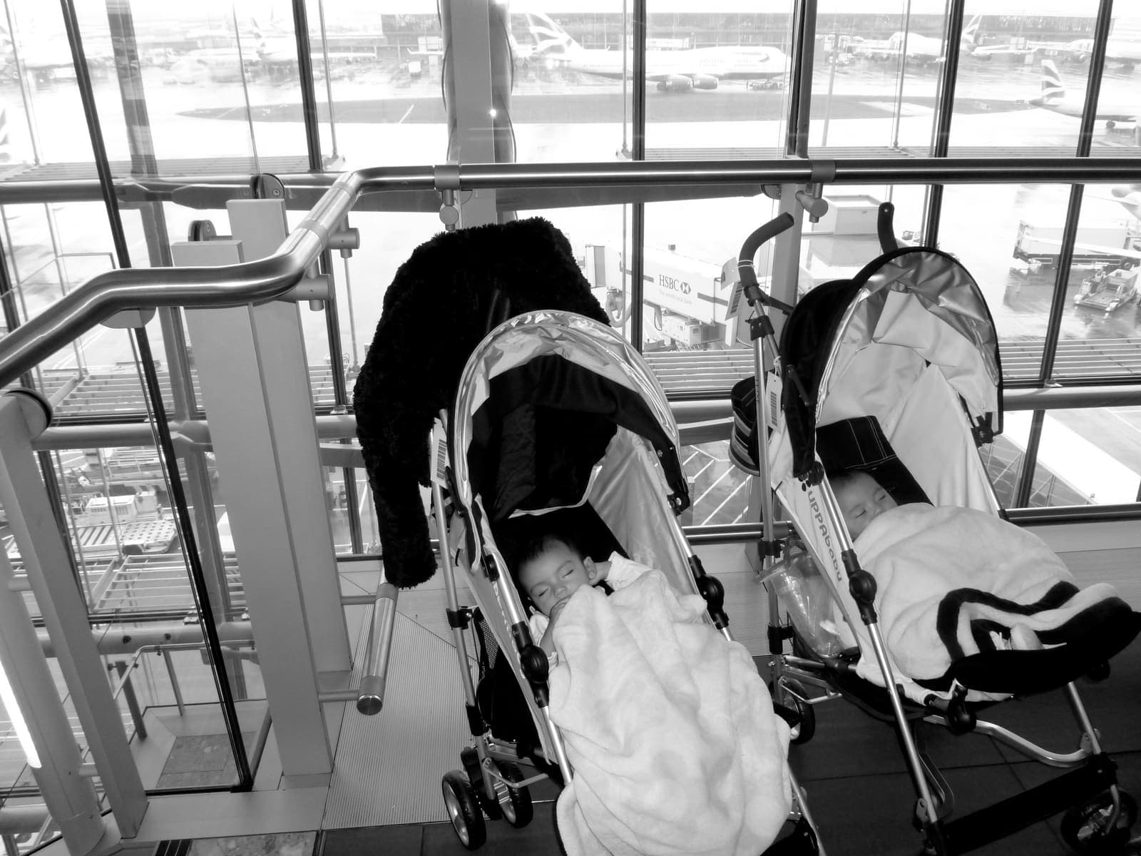 Flying With Twins: Airline Seat Math, Gate-Check Gear, and Survival Tips